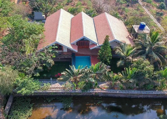 Aranyam Villa By Stayvista With Modern Wooden Interiors, Kidszone, Indoor Games & Plunge Pool